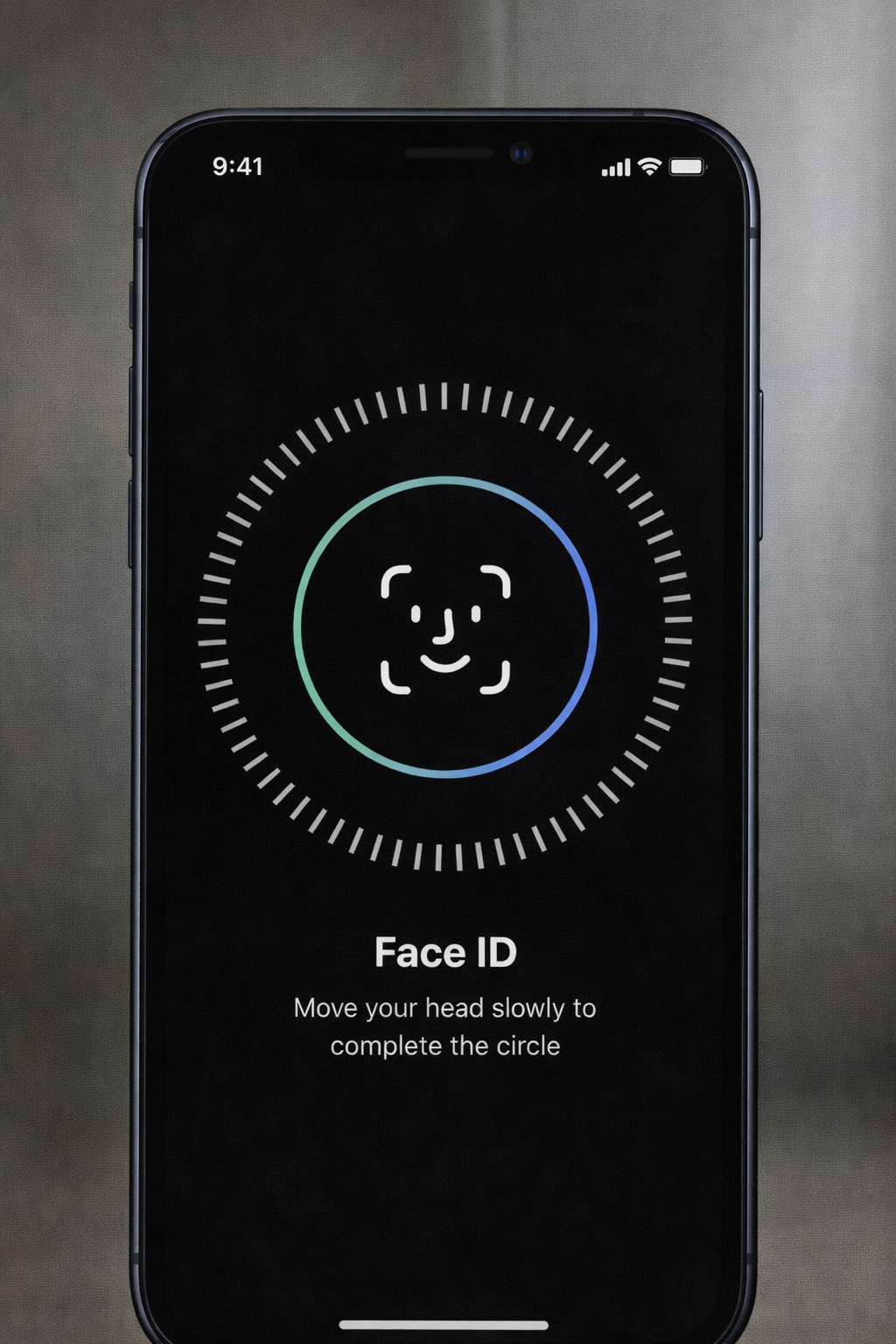 alt="iPhone displaying the Face ID recognition screen"