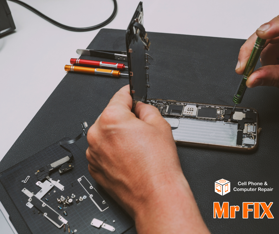 alt="Mr Fix technician inspecting and repairing a damaged phone charging port
