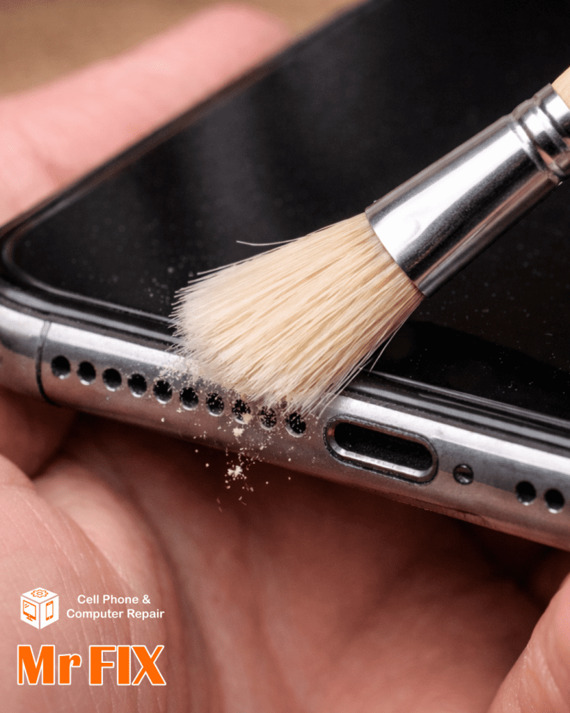 Cleaning phone speaker grill with soft brush